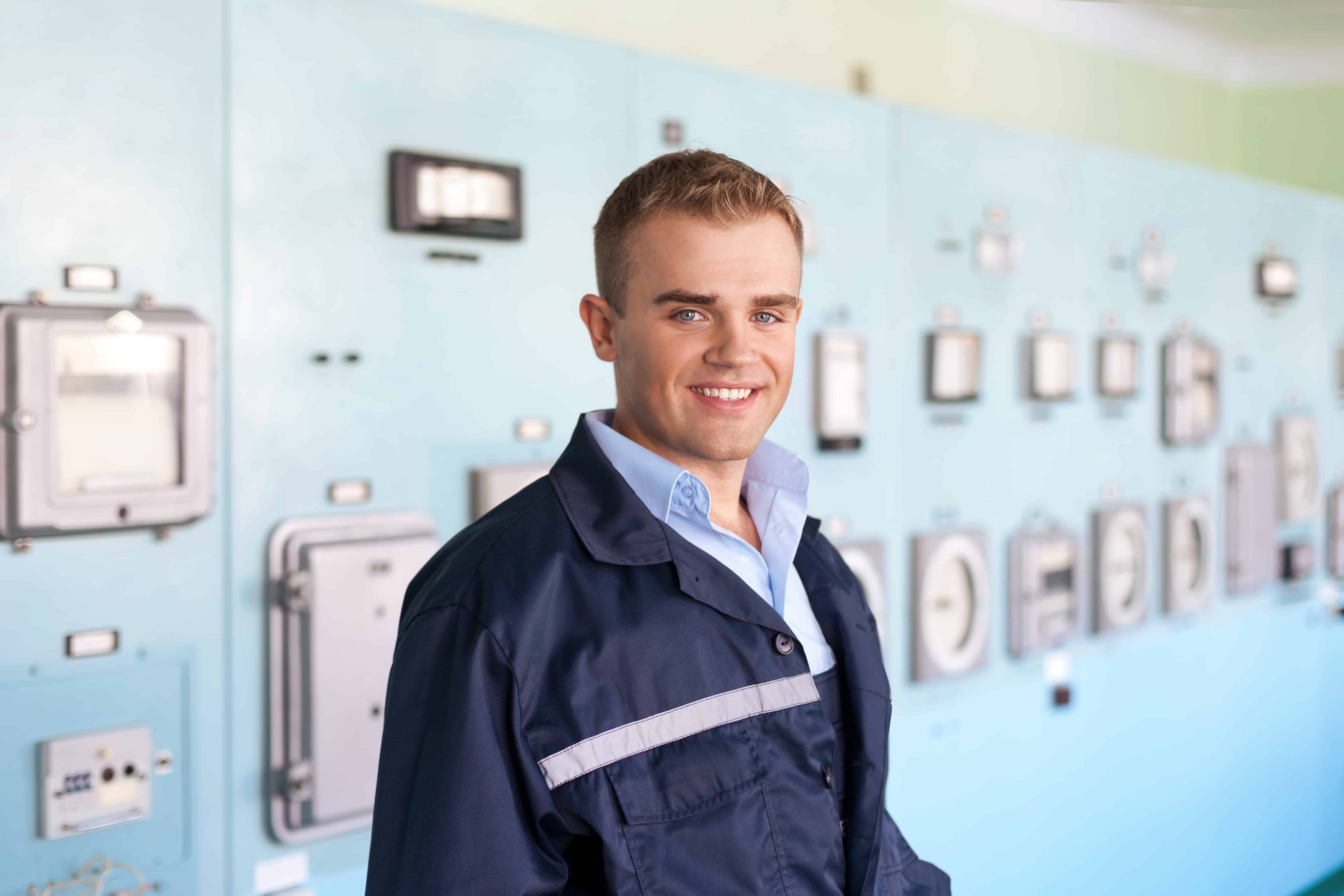 Portrait of young engineer at control room